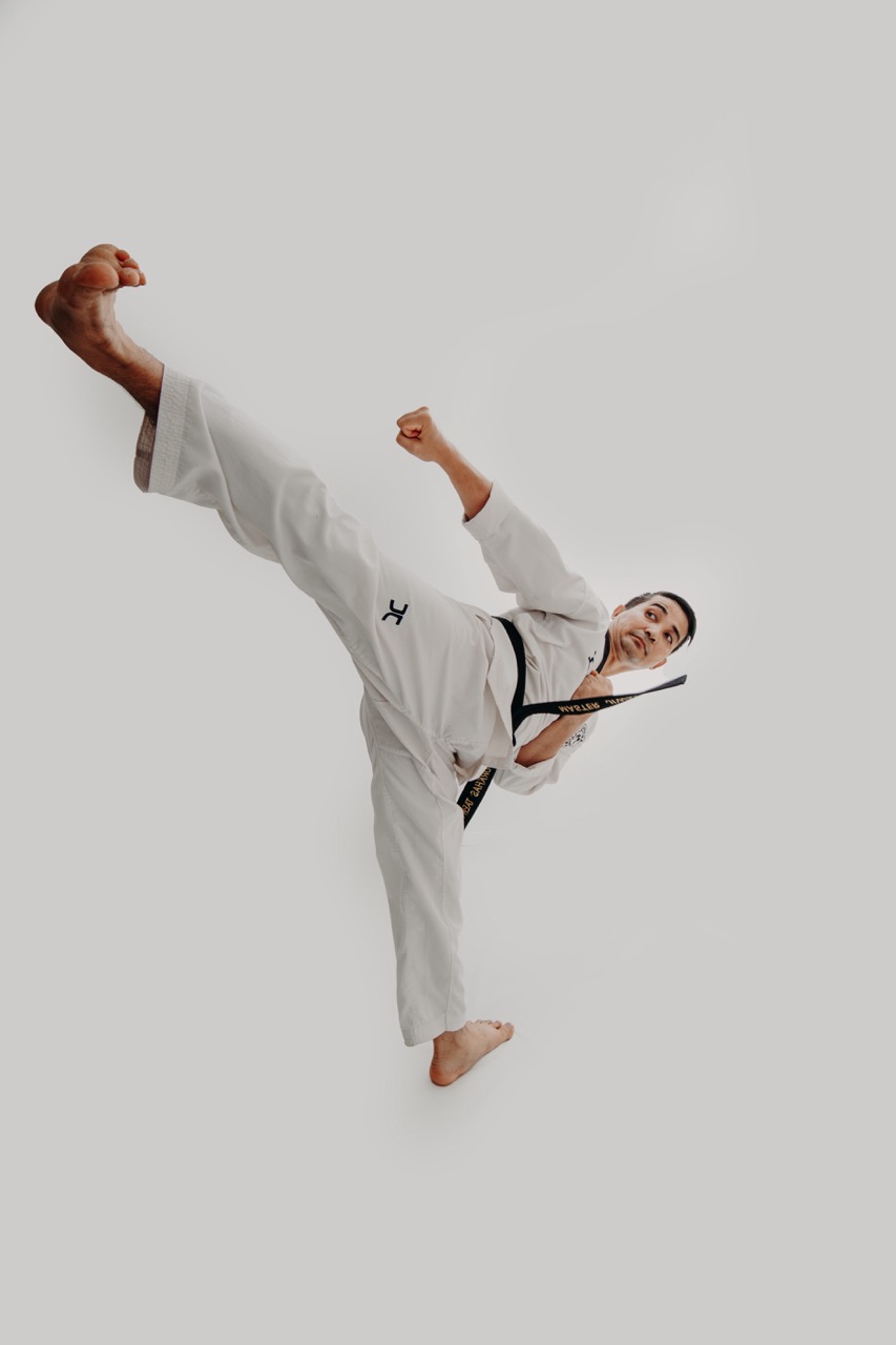 Gurkhas Taekwondo student performing a high kick