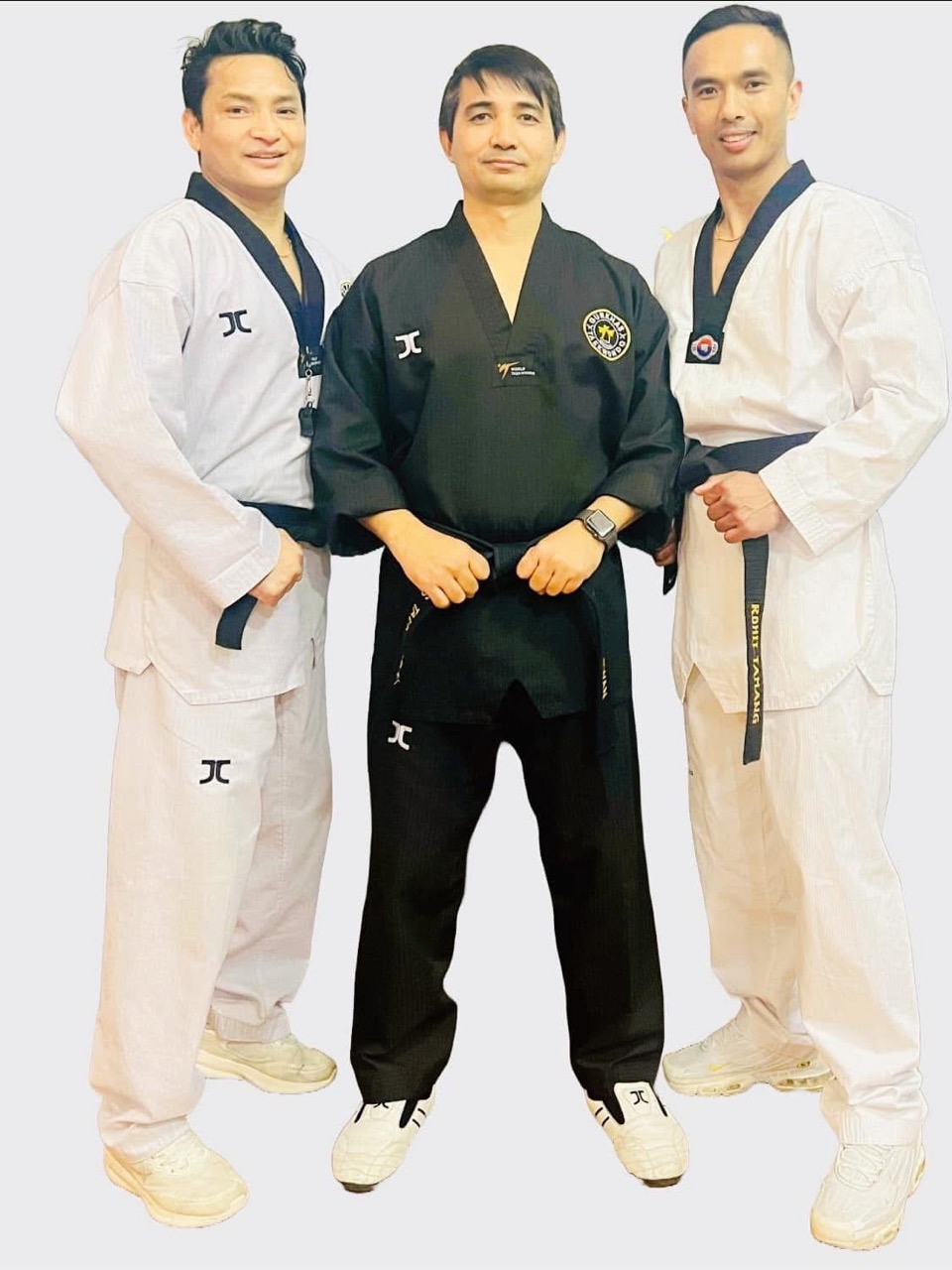Taekwondo instructors standing together
